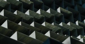 Dynamic geometric pattern of an architectural facade in Toronto, showcasing modern design.